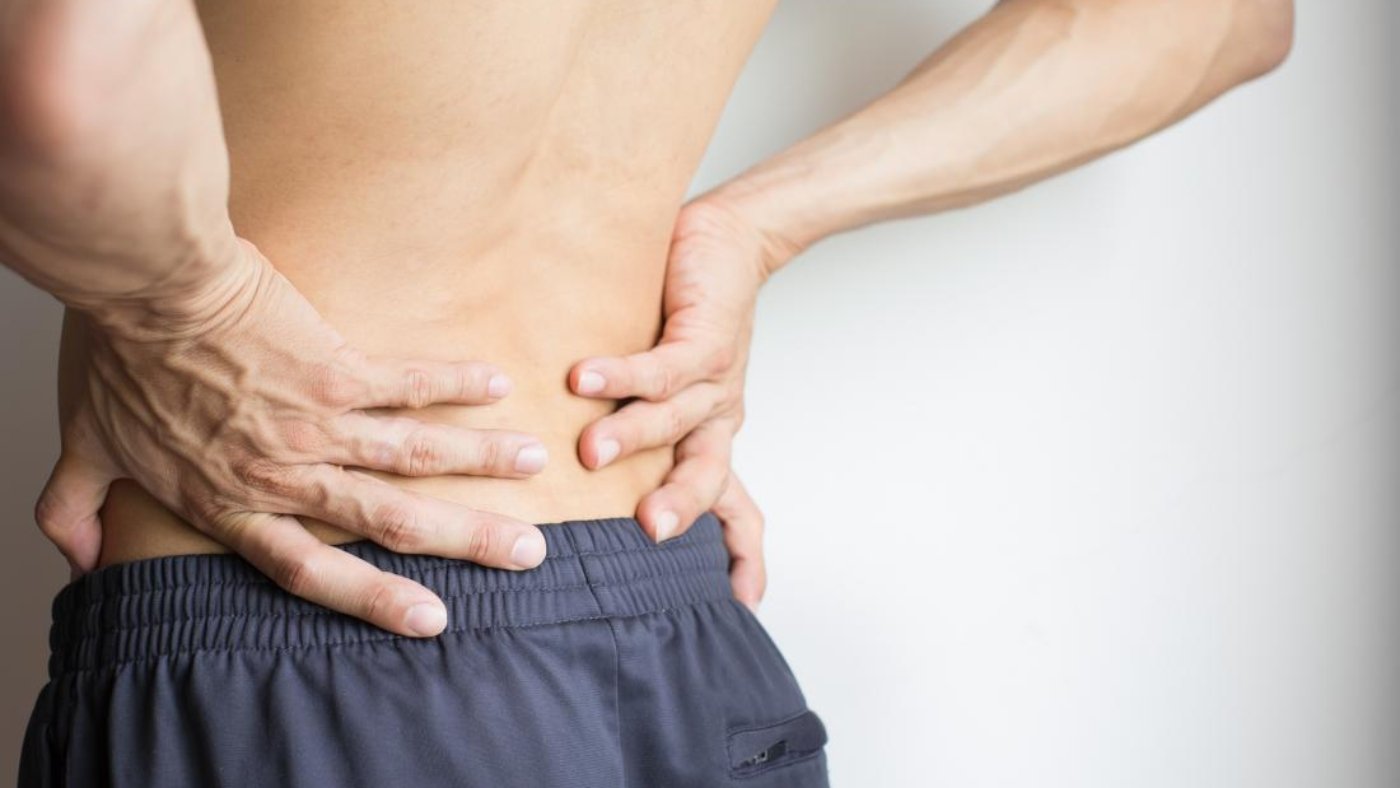 man-holding-his-back (1)